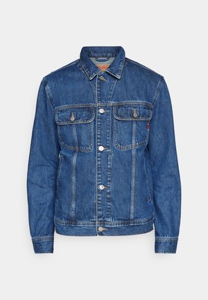 Jeansjacka i mörkblått med klassisk snitt. Har två bröstfickor, knäppning med knappar och stickade detaljer på ärmar och nederkant.