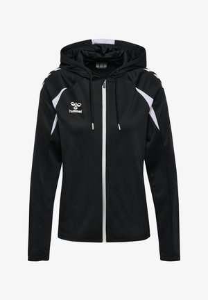 Schwarzer Kapuzenpullover mit Reißverschluss, weißen Streifen an den Seiten und Schultern, Kordelzug an der Kapuze und einem weißen Hummel-Logo auf der Brust.