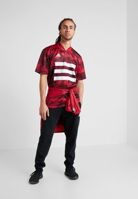 adidas Performance TAN - T-shirt con stampa - bordeaux