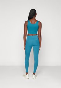 ONLY Play ONPJAM-3-SANA - Leggings - dragonfly