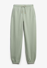 Jasnozielone dresy z elastycznym paskiem w talii i sznurkiem do regulacji. Posiadają ściągacze na kostkach oraz boczne kieszenie. Małe logo wyszyte z przodu.