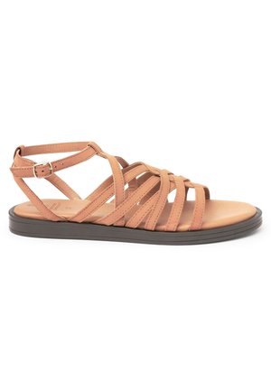 Tan leather strappy sandal with a flat brown sole. Features multiple horizontal straps and an adjustable ankle buckle for fit.