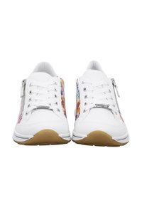 White lace-up sneakers with side zippers and multicolored floral patterns on the sides, viewed from the front.