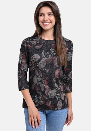 Schwarzes Langarmshirt mit floralem Muster in Rot- und Grautönen. Weicher Stoff mit strukturiertem Finish und leicht lockerer Passform.
