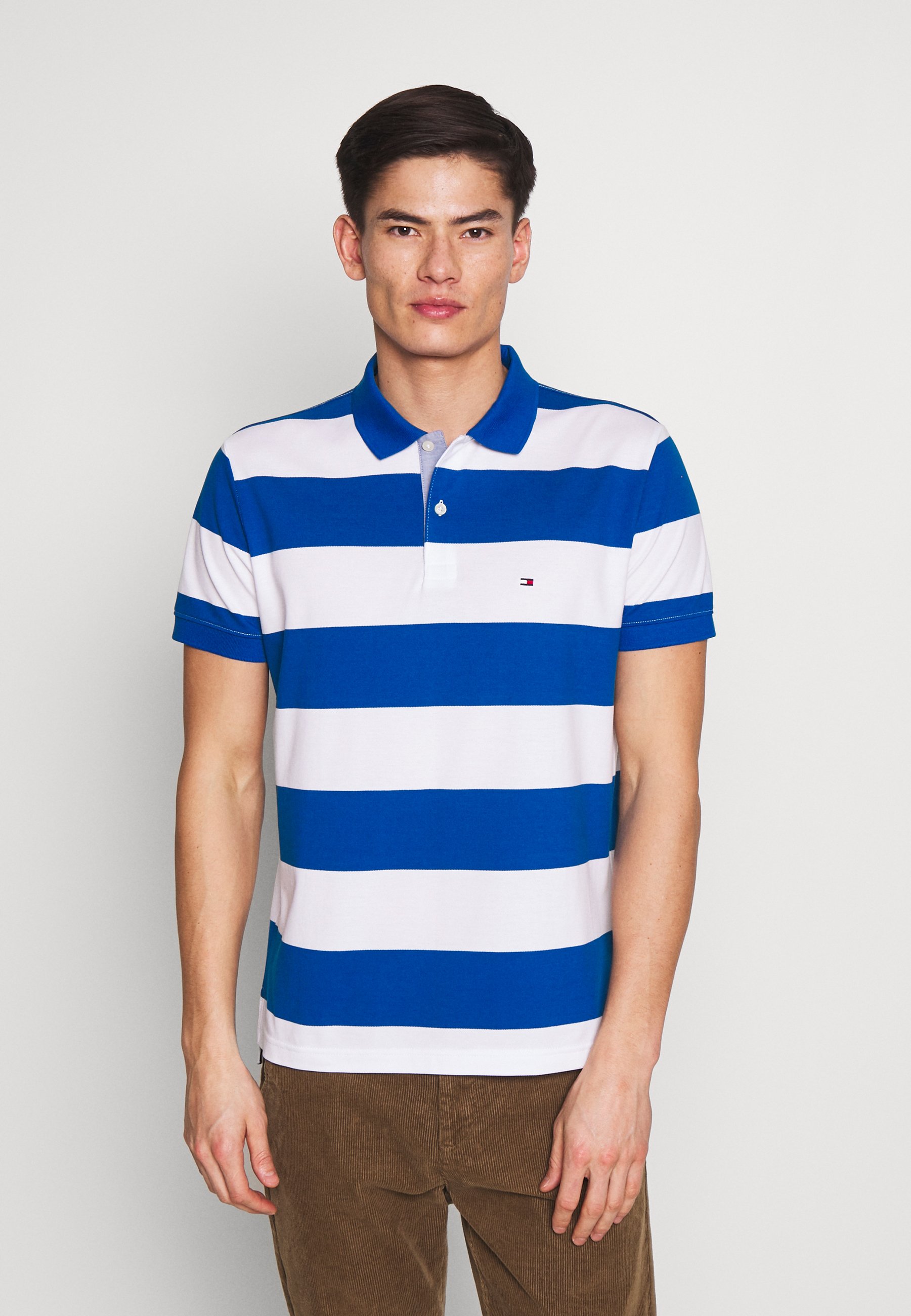 Tommy Hilfiger BLOCK STRIPE REGULAR POLO - Polo shirt - blue - Zalando.ie