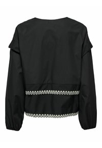 Czarna krótka kurtka z okrągłym dekoltem, z falbanami na rękawach oraz białą koronkową lamówką na dole. Gładka tekstura.