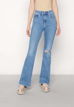 Flared Jeans - destroyed denim