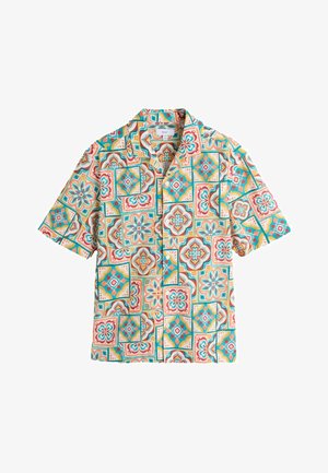 Short-sleeve button-up shirt with colorful geometric and floral tile patterns in teal, orange, yellow, and red on a white background.