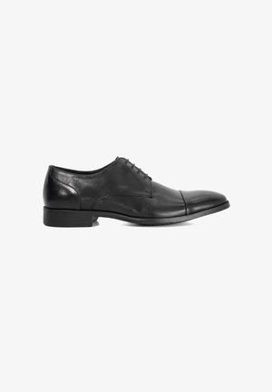 Black leather dress shoe with a rounded toe, smooth texture, six eyelets, and a low heel. Features a subtle seam and sleek design.