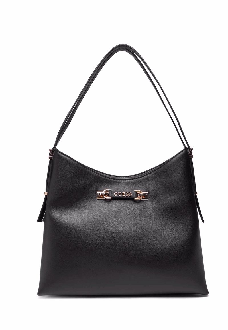 sac à main en cuir noir avec une texture lisse, forme ovale et une bandoulière. Présente un logo métallique proéminent et des accents.