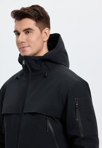 Luhta KOTKAVUORI - Softshelljacke - schwarz