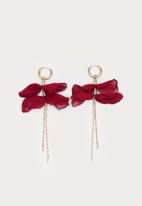 Gold hoop earrings with layered sheer burgundy fabric petals and delicate gold chain dangles on white background.