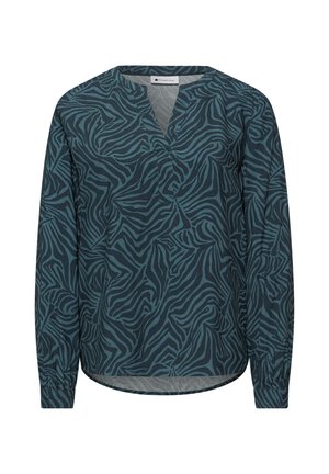 Blouse à manches longues avec rayures zébrées abstraites en vert sarcelle foncé et noir, encolure en V et poignets boutonnés.