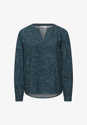 Halenka s dlouhým rukávem s tmavě tyrkysovými a černými abstraktními pruhy ve vzoru zebry, výstřihem do V a knoflíkovými manžetami.