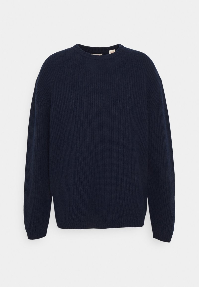 Navyblauer gerippter Pullover mit Rundhalsausschnitt und langen Ärmeln. Weicher Stoff, lockere Passform und minimalistisches Design ohne sichtbare Verschlüsse oder Akzente.