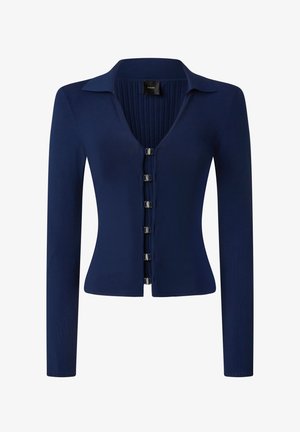 Cardigan lungo blu navy con maniche lunghe, collo a V, texture a coste e sei chiusure a pressione metalliche al centro davanti. Finitura in tessuto liscia.