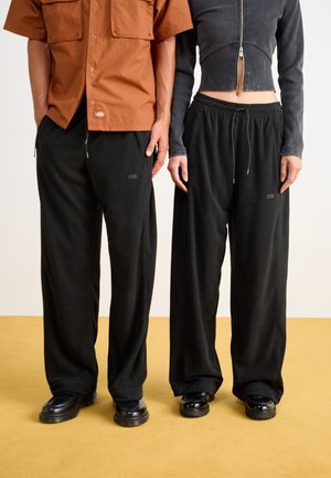 ADDIS PANTS WIDE UNISEX - Trousers - black