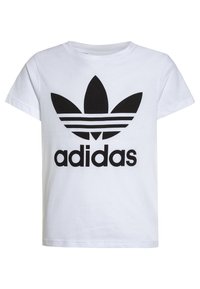 T-shirt bianco in cotone con grande logo trefoil nero di Adidas e nome del marchio in carattere bold. Classico collo rotondo e maniche corte.