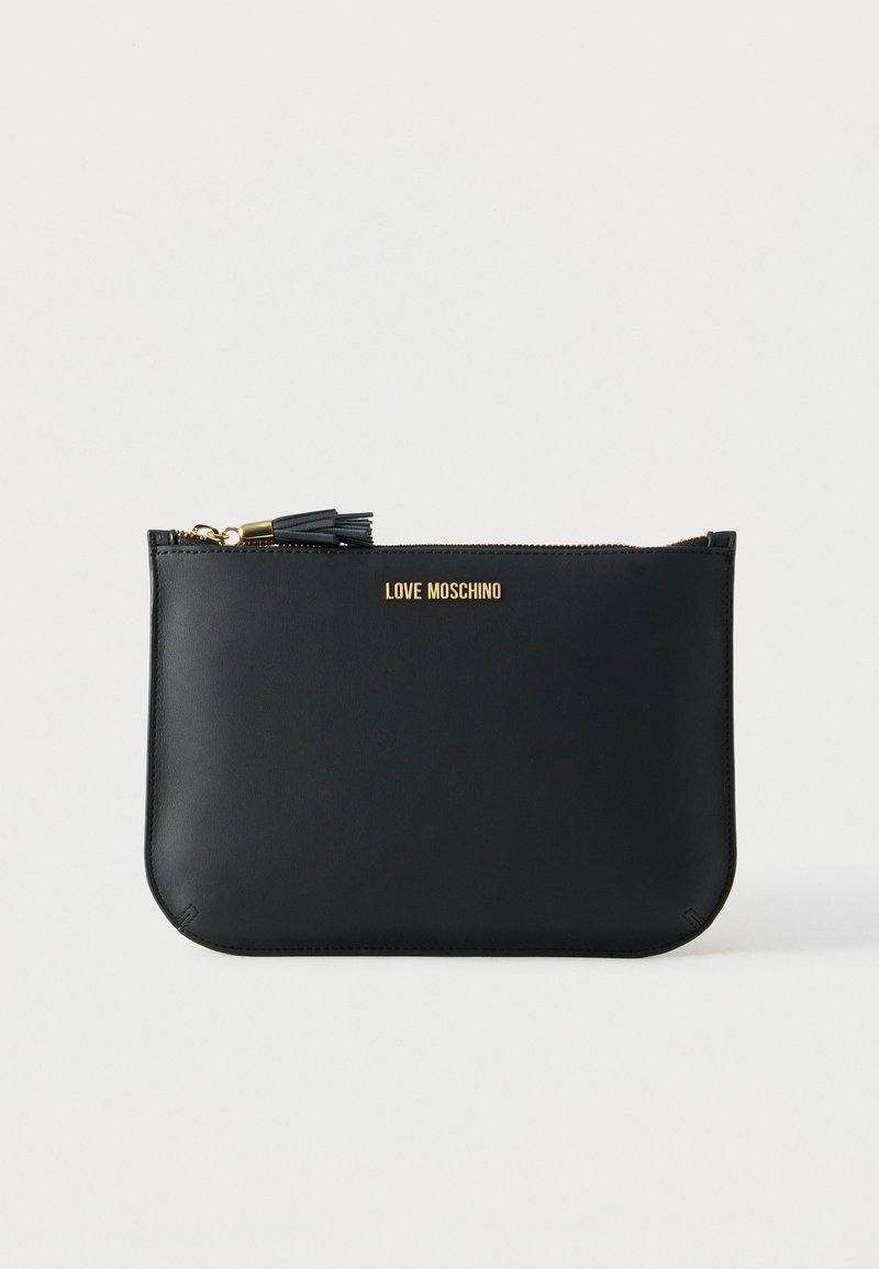Black leather clutch with a smooth texture, featuring a gold logo, zip closure, and a tassel accent. Compact rectangular design.