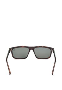 Lunettes de soleil rectangulaires en écaille de tortue avec verres gris et branches droites, positionnées face à face sur un fond blanc.