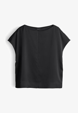 Blusa nera a maniche corte con scollo a barca, vestibilità ampia e dettaglio di cucitura verticale centrale, mostrata su sfondo bianco.