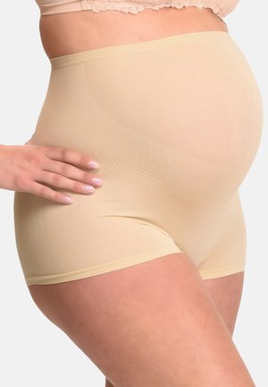 Beige graviditetsshorts lavet af glat, strækbart materiale med en høj talje. Har en subtil ribbet design og en tætsiddende silhuet.