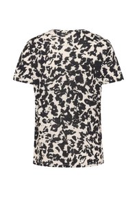 Lühikeste varrukatega T-särk beeži taustaga ja ebaregulaarselt musta abstraktse loomamustriga seljal.