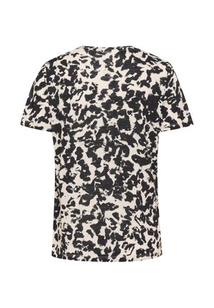 Lühikeste varrukatega T-särk beeži taustaga ja ebaregulaarselt musta abstraktse loomamustriga seljal.