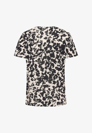 Lühikeste varrukatega T-särk beeži taustaga ja ebaregulaarselt musta abstraktse loomamustriga seljal.