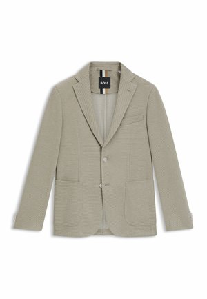 Helles graues Blazer aus strukturiertem Stoff. Verfügt über aufgeschlagene Revers, zwei Fronttaschen und eine einzelne Brusttasche mit Knopfverschluss.