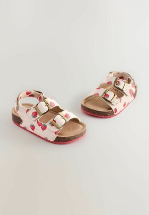Erdbeer-muster Sandalen mit zwei verstellbaren Schnallen, einer gepolsterten Innensohle und einer pinkfarbenen Gummisohle. Hergestellt aus Textil- und Korkmaterialien.