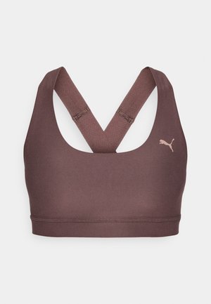 Rjava športna modrčka z zasnovo racerback, narejena iz gladke tkanine. Ima majhen, nežen logotip na levi strani in šive brez roba.