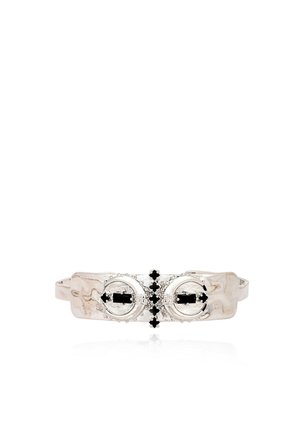 Silver bracelet with textured surface featuring two round black gemstone accents connected by a cross of smaller black stones.
