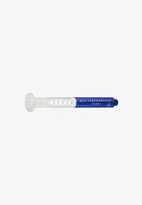 Applicateur de soins de la peau bleu et blanc avec une tête circulaire texturée et un corps cylindrique comportant des mesures et des étiquettes de marque.
