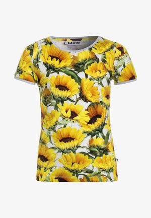 Camisa de manga corta con un vibrante estampado de girasoles sobre un fondo blanco. Fabricada en tejido de jersey, con cuello redondo y un diseño ajustado.