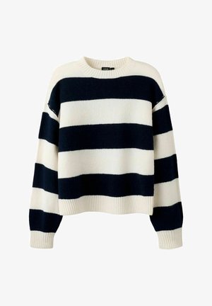 Triibuline kampsun tumesiniste ja kremikarva toonidega, valmistatud pehmest kangast. Omadusteks on ümar kaelus, langevad õlad ning soonilised varrukaotsad ja alumine äär.