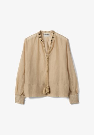 Beige Bluse mit langen Ärmeln aus strukturiertem Stoff, geflochtenen Quastenbändern am Ausschnitt, bestickten Manschetten und lockerem Schnitt von Stefanel.