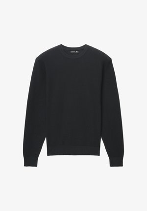 Maglione nero a maniche lunghe con texture a coste e scollo tondo. Presenta polsini aderenti e orlo dritto. Etichetta della taglia visibile.