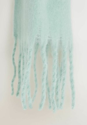 Mint green scarf made of soft, fuzzy material with long, fringed ends. The texture is light and airy, enhancing its delicate appearance.