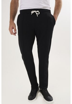CASUAL JOGGER - Jogginghose - black