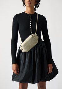 Marimekko PIKKU KARLA - Taška cez plece - beige