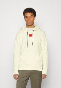 HUGO DARATSCHI - Sweatshirt com capuz - light pastel yellow