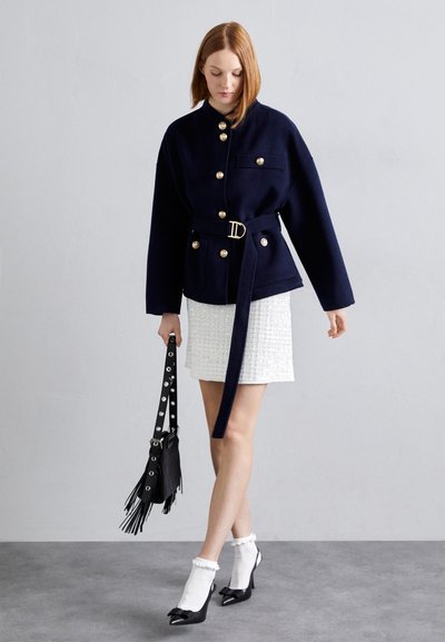 Maje Soma ar siksnu pāri ķermenim - noir