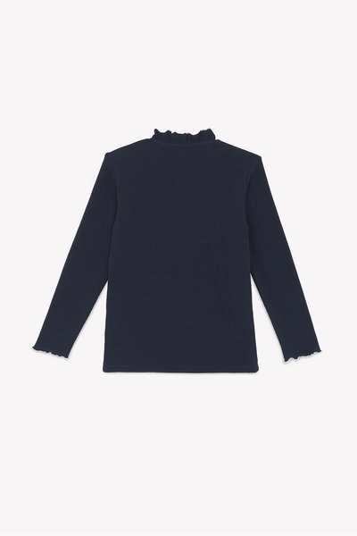 Mornarica majica s dugim rukavima z ruffles ovratnikom i scalloped manžetama. Mekani materijal, uže krojenje, jednostavna struktura, jednostavna bez uzoraka ili akcenta.