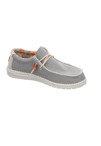Zapato de tela gris sin cordones con suela de goma blanca. Presenta una parte superior texturizada, un forro colorido en contraste y cordones neutros.