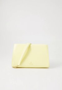 Yellow leather handbag with a textured finish, a top handle, and a detachable chain strap. Features a subtle logo on the front.