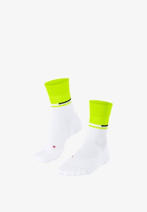 White athletic socks with bright yellow cuffs, featuring a narrow black stripe. Made of a smooth, stretchy material. Red logo on the heel.
