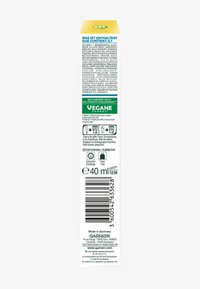 Tubetto di prodotto Garnier, packaging verde e giallo, contiene 40 ml, con testo in tedesco e francese, codice a barre nella parte inferiore.