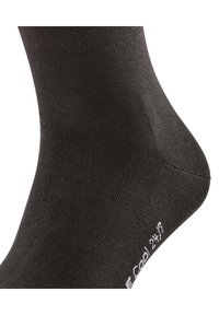 Schwarze Baumwollsocke im Crew-Stil mit glatter Textur und geripptem Design. Verfügt über eine verstärkte Zehen- und Fersenpartie sowie Branding im Knöchelbereich.