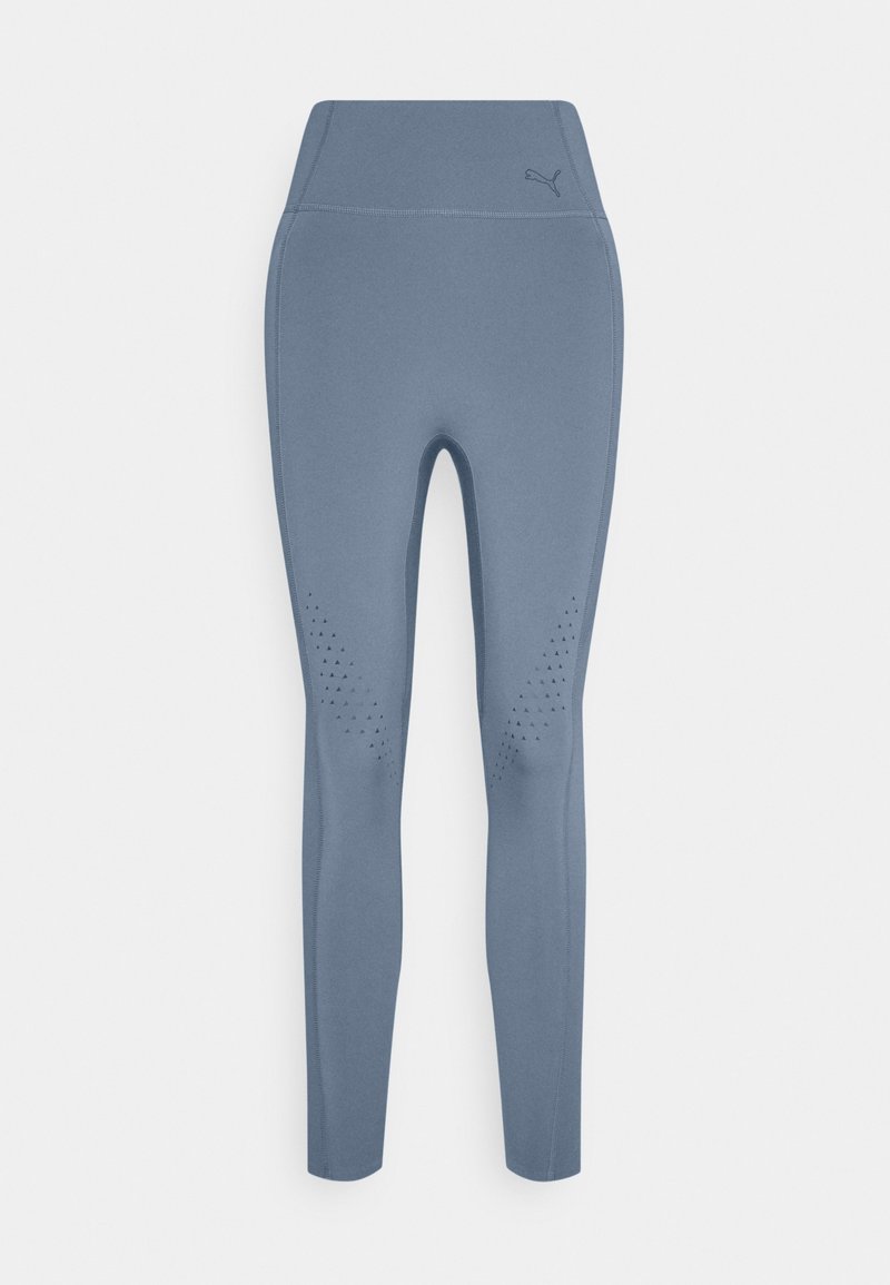 Blå träningsleggings i stretchigt material, med hög midja, perforerade detaljer nära underbenet och en diskret logotyp.